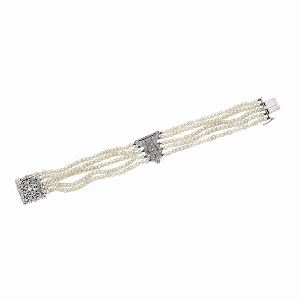 Bracciale in oro bianco, microperle e diamanti