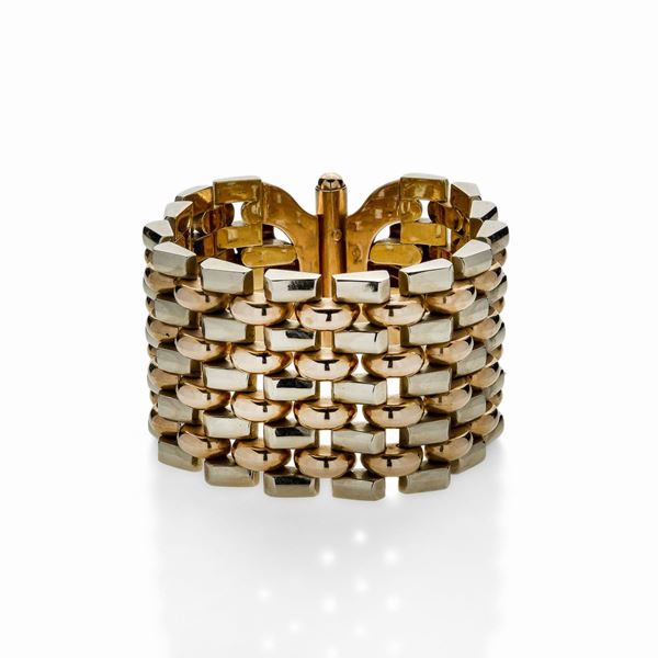 Alto bracciale in oro rosa e oro giallo