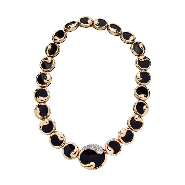Collier in yellow gold, onyx and diamonds