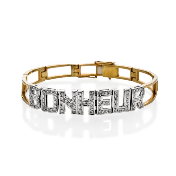 Bracelet in yellow gold, white gold and diamonds