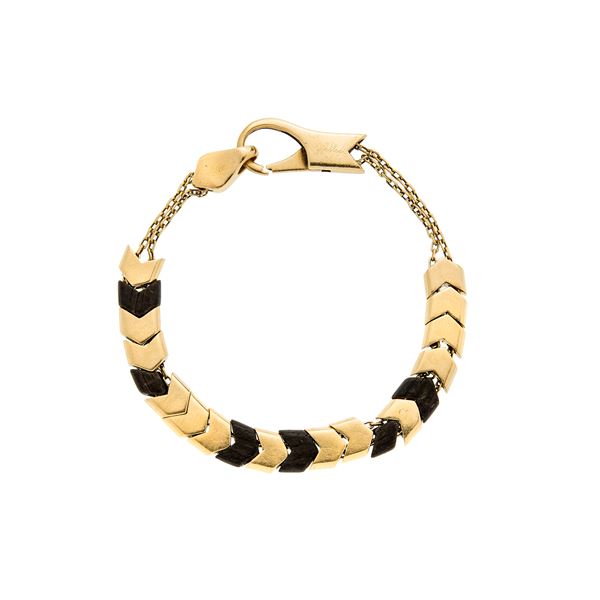 Bracelet in yellow gold and wood