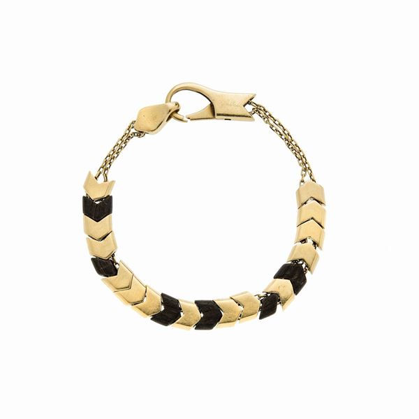 Bracciale in oro giallo e legno  - Asta Gioielli Antichi e Moderni  - Curio - Casa d'aste in Firenze