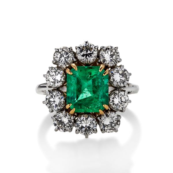 Ring in white gold, yellow gold, diamonds and emeralds