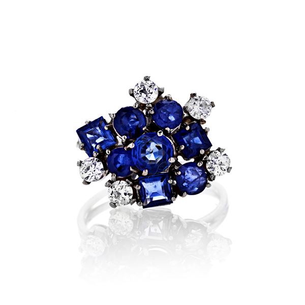Ring in white gold, diamonds and eight sapphires