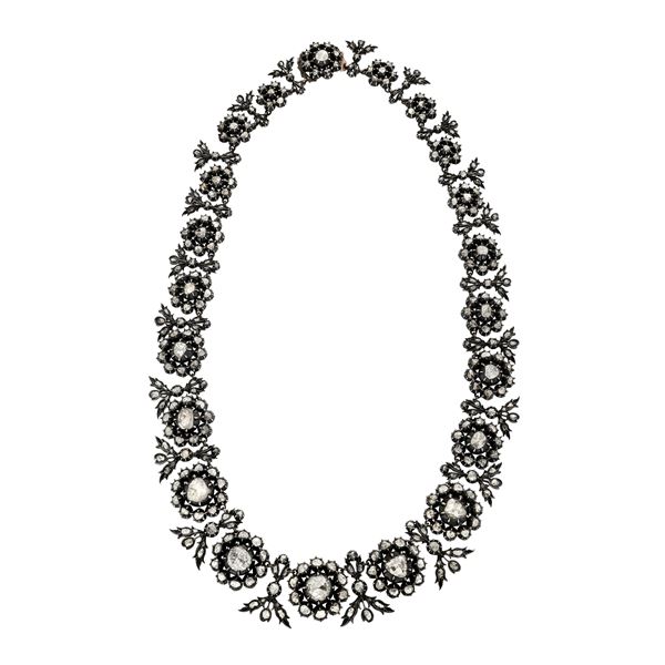 Important Collier in gold with a low title, silver and diamonds