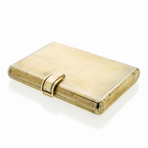 Trousse in argento dorato e oro giallo