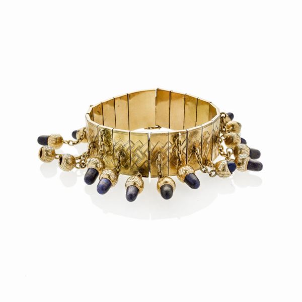 Bracelet in yellow gold and lapis lazuli