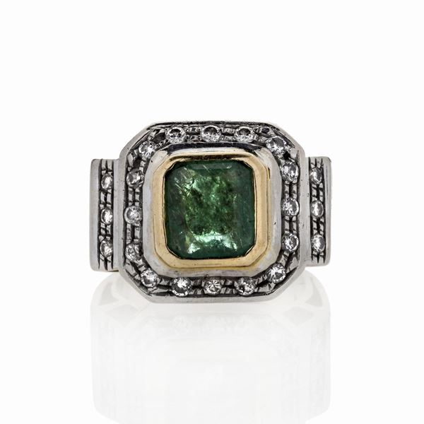 Ring in yellow gold, white gold, diamonds and emeralds