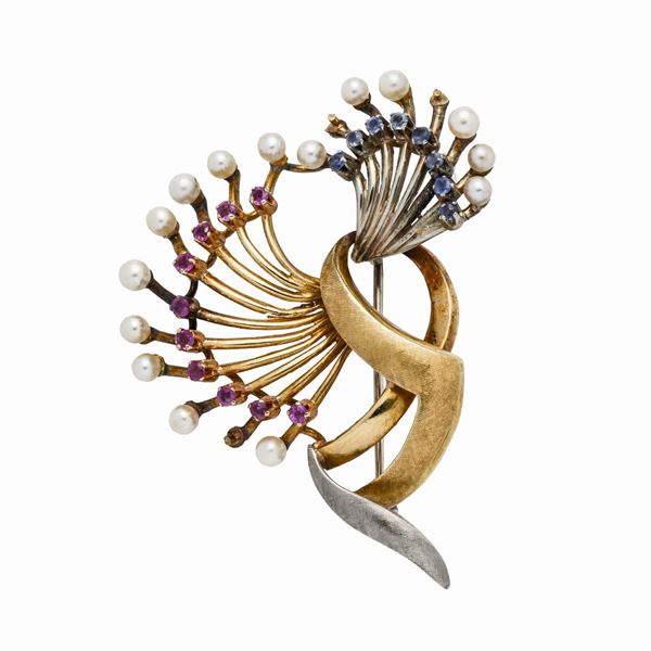 Brooch in yellow gold, white gold, pearls, rubies and sapphires