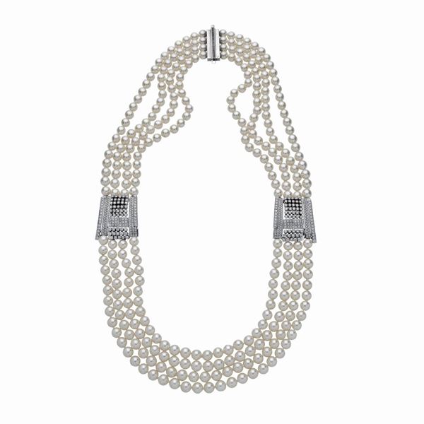Importante collana in perle giapponesi, oro bianco e diamanti