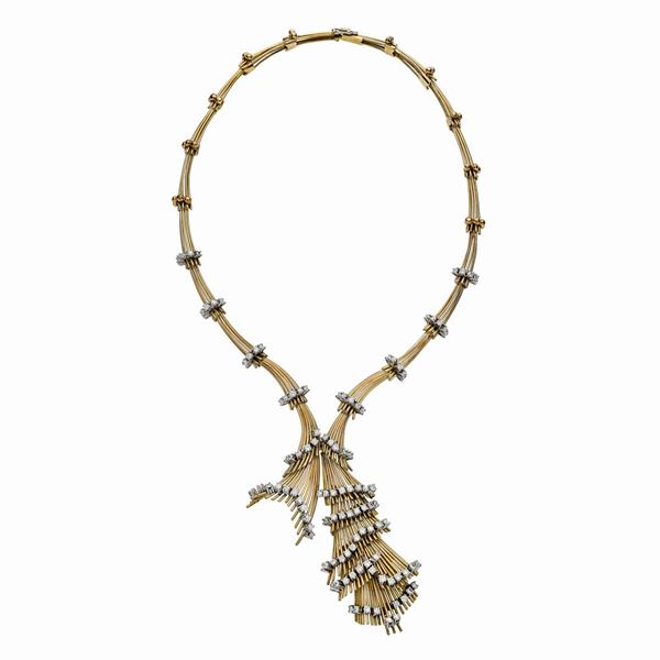 Semi-rigid necklace in yellow gold and diamonds