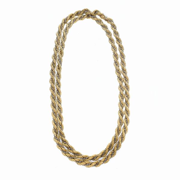 Lunga collana a torchionne in oro giallo e bianco