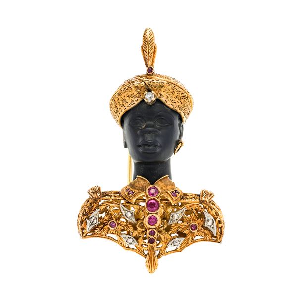 Brooch Moro in yellow gold, white gold, ebony, diamonds and rubies