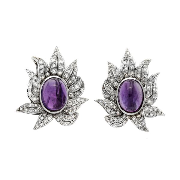 Pair of clip earrings in white gold, diamonds and amethyst