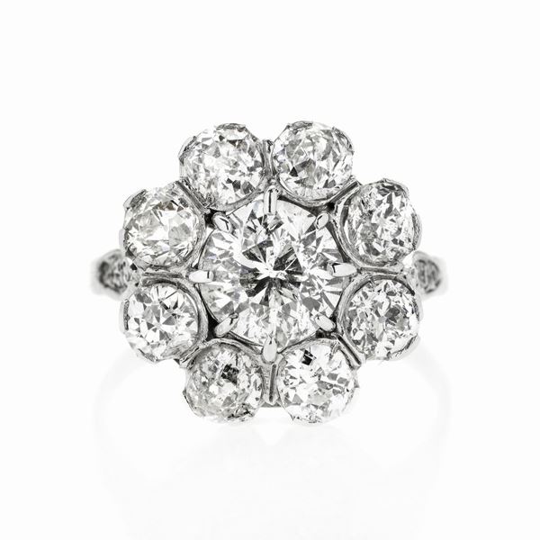 Anello fiore in oro giallo e diamanti