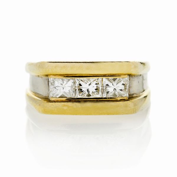Anello trilogy in oro giallo, oro bianco e diamanti