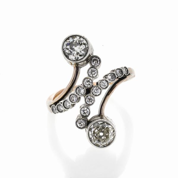 Anello contrariè in oro a basso titolo e diamanti