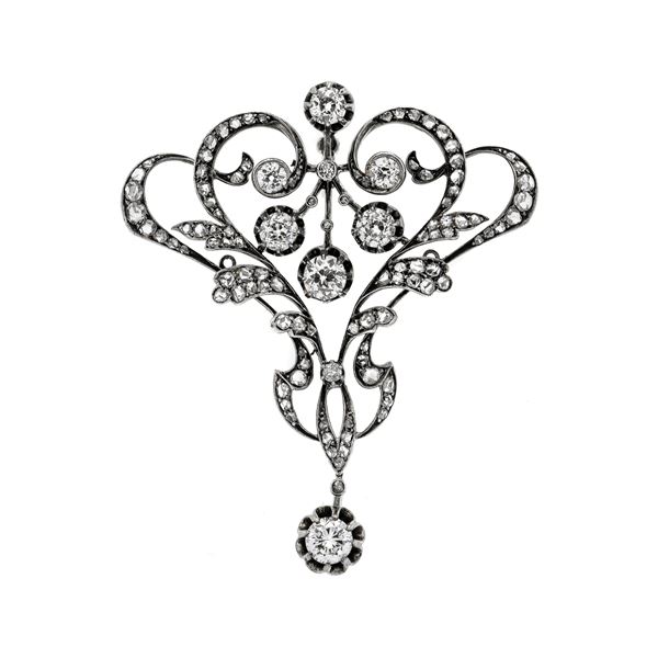 Brooch in low titer gold,  silver and diamonds