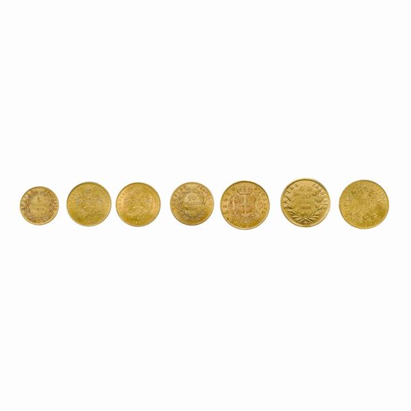 Sette monete varie in oro giallo