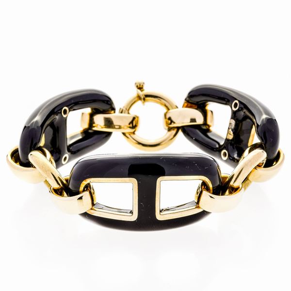 Bracciale in oro giallo, argento  e onice