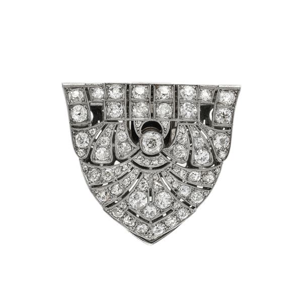 Shield clips in platinum and diamonds
