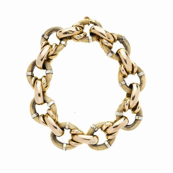 Bracciale a maglie in oro giallo e oro bianco