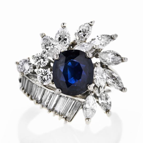 Anello in oro bianco, diamanti e zaffiro