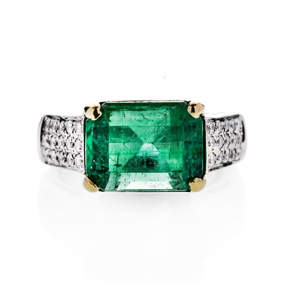 Ring in white gold, yellow gold, diamonds and emeralds