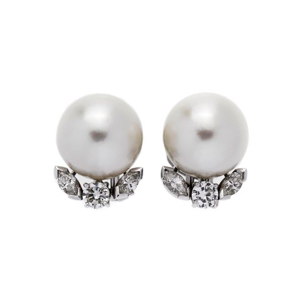 Pair of clip earrings in white gold, diamonds and Australian pearls