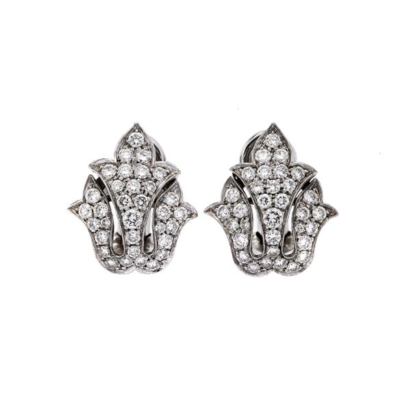 Pair of clip earrings in white gold and diamonds