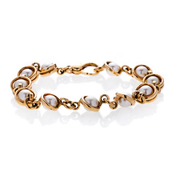 Bracelet in yellow gold and cultivated pearls Cusi