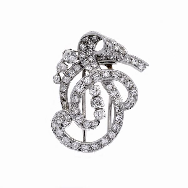Clip in oro bianco e diamanti