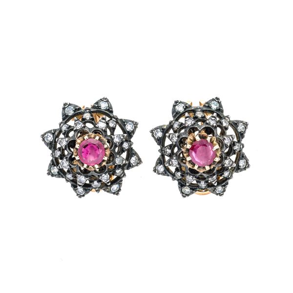 Pair of clip-on earrings in yellow gold, silver, diamonds and ruby
