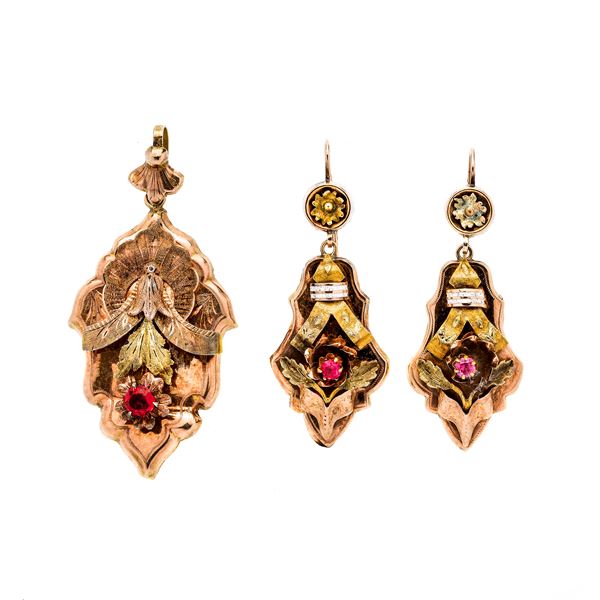 Pair of earrings and gold pendant with low title and stones