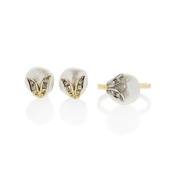 Set in yellow gold, white gold, diamonds and scaramazze pearls