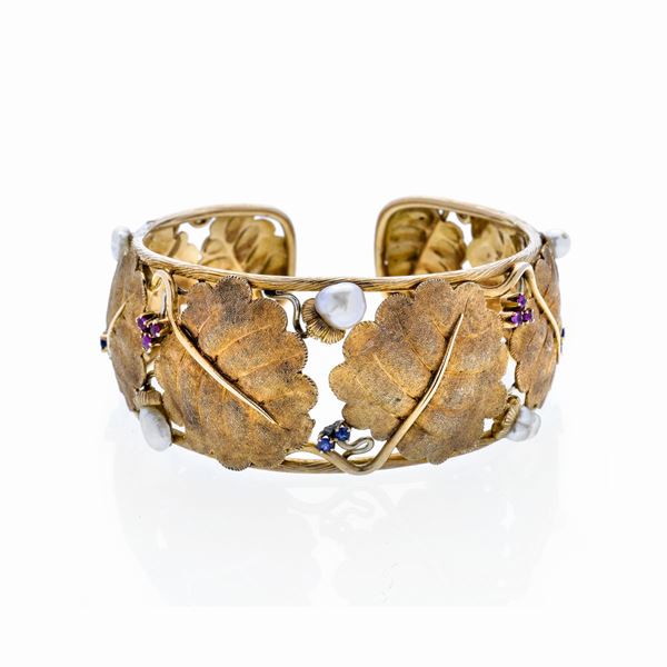 Rigid bracelet in yellow gold, sapphires, rubies and pearls