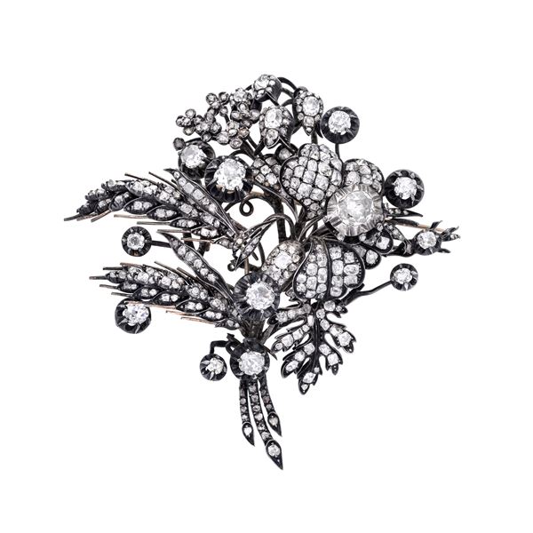 Important brooch in gold low titer, silver and diamonds