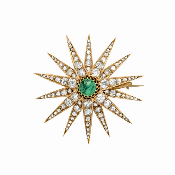 Spilla stella in oro giallo, diamanti e smeraldo