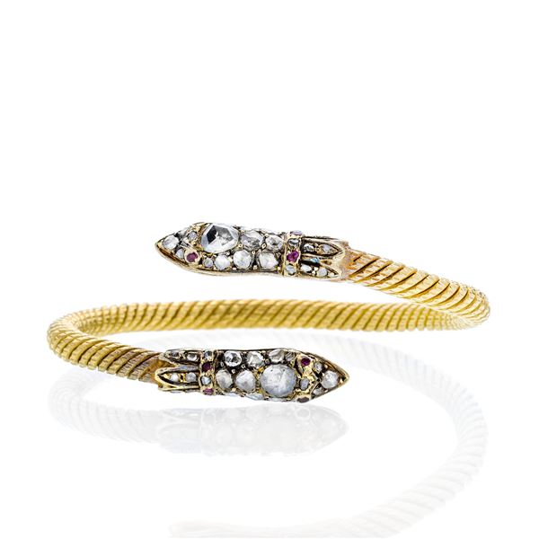 Snake bracelet in yellow gold, rubies and diamonds