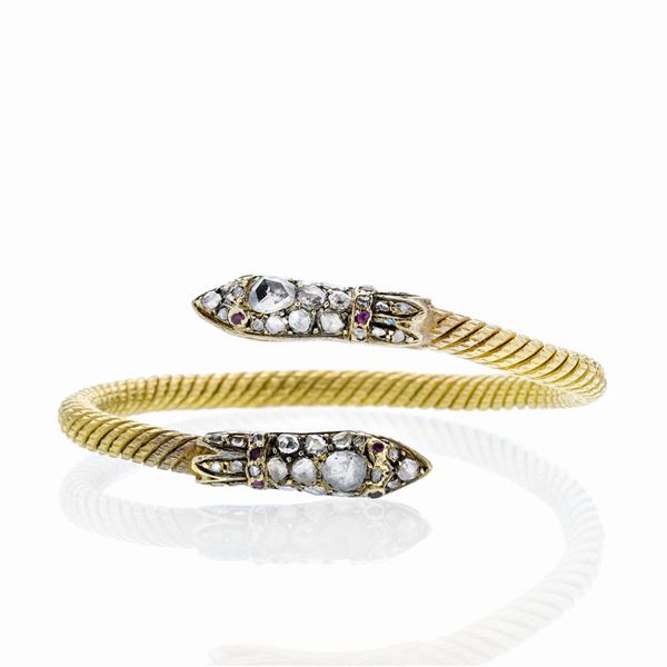 Snake bracelet in yellow gold, rubies and diamonds