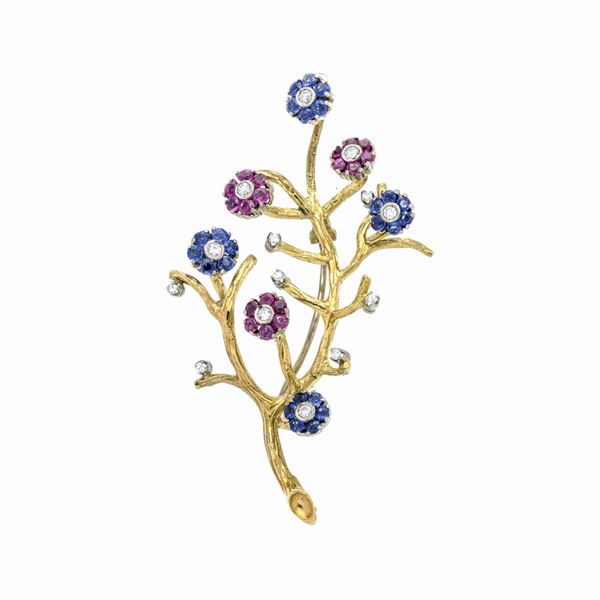 Brooch en tremblant in yellow gold, diamonds, sapphires and rubies
