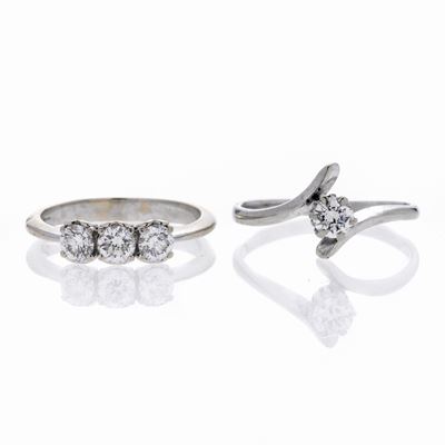 Anello Trilogy in Oro Bianco e Diamanti ed un Anello Solitario