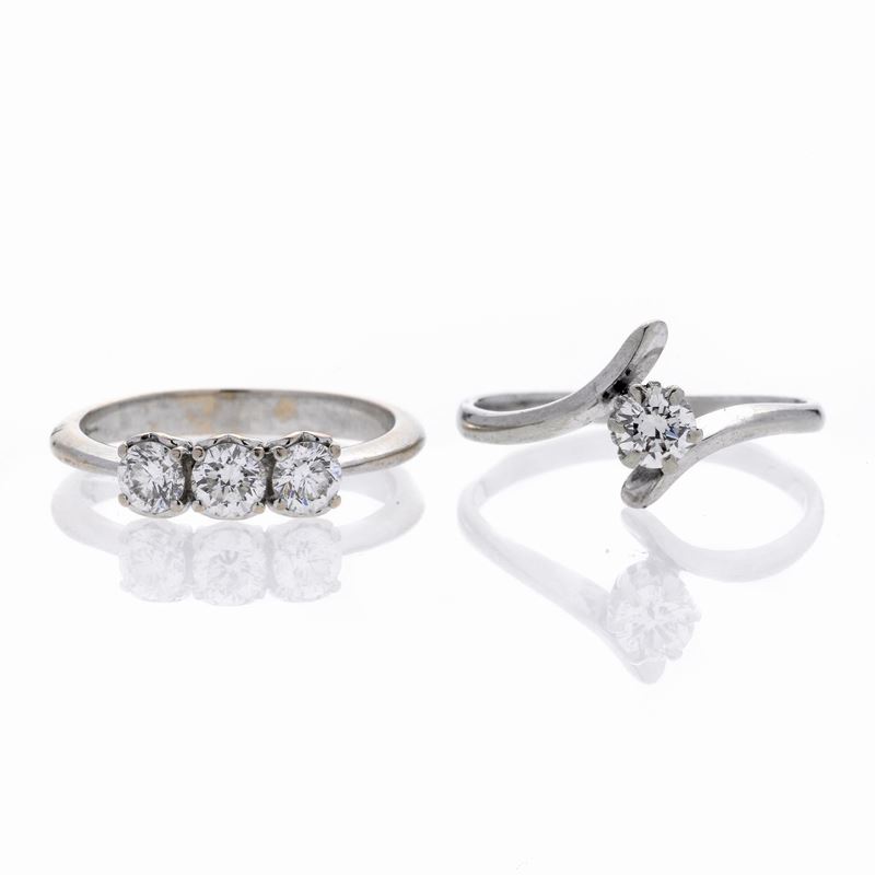Anello Trilogy in Oro Bianco e Diamanti ed un Anello Solitario