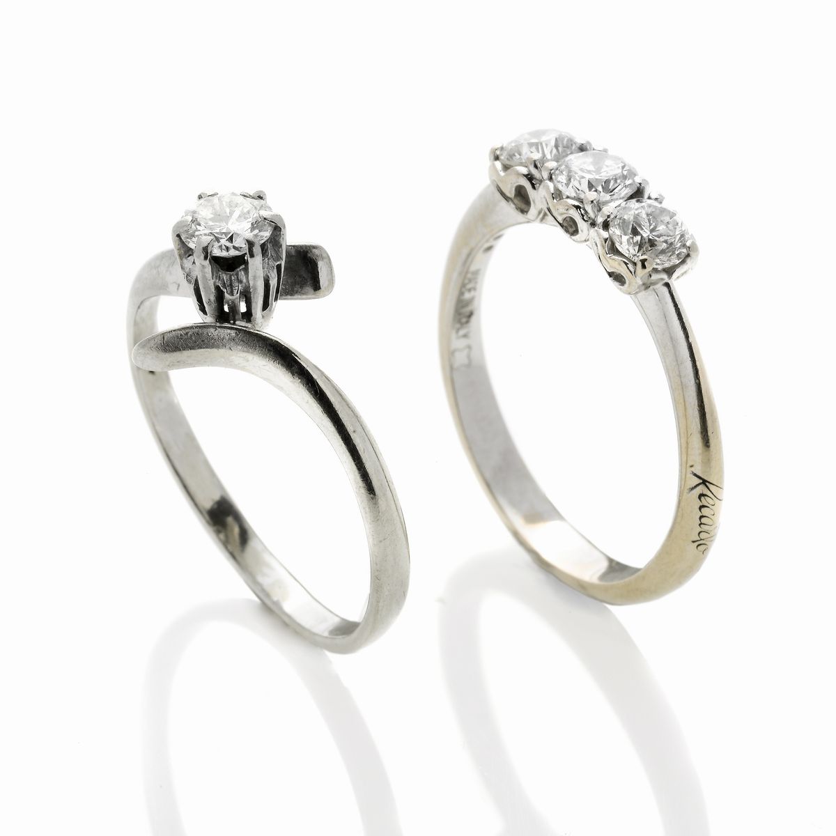 Anello Trilogy in Oro Bianco e Diamanti ed un Anello Solitario