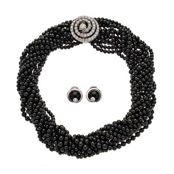 Necklace and earrings in white gold, diamonds and onyx