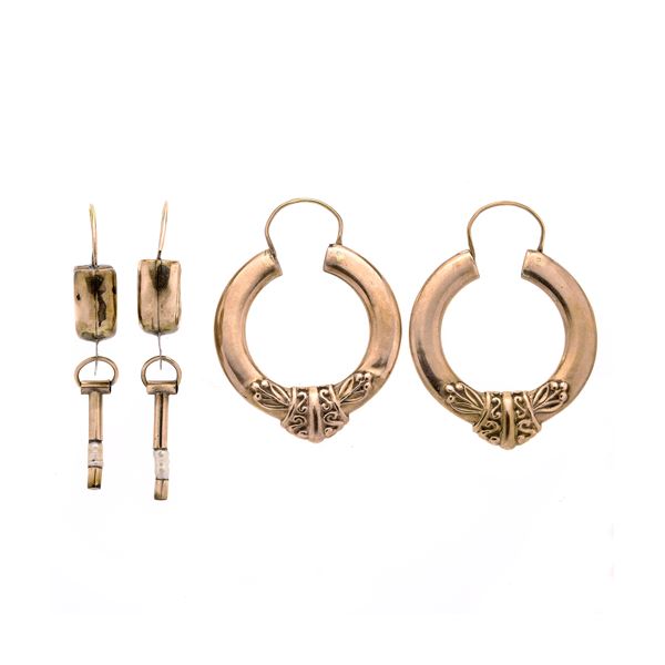 Pair of large, low-key gold safety earrings, pearls and another pair in low-key gold