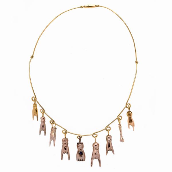Collier in oro giallo con nove pendenti scaramantici