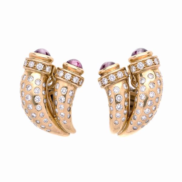 Pair of cornucopia earrings in yellow gold, diamonds and rubies
