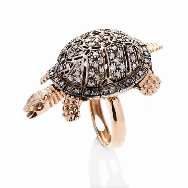 Turtle ring in low title gold, silver and diamonds