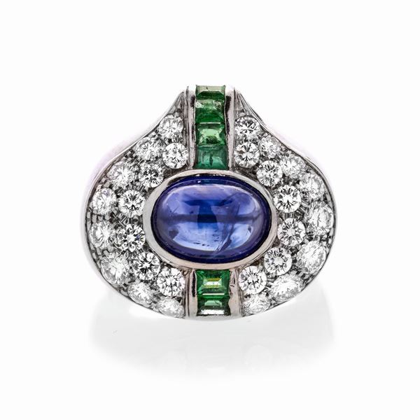 Bridge ring in white gold, diamonds, emeralds and sapphire